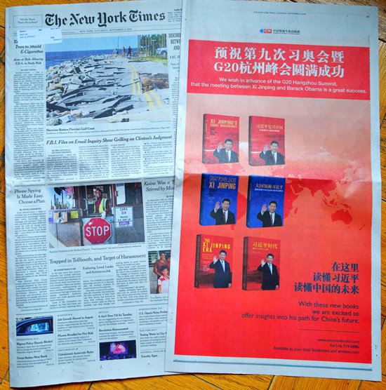 《紐約時報》推介《習(xí)近平復(fù)興中國》和《大國領(lǐng)袖習(xí)近平》兩本英文圖書的廣告(攝影 殷淼)