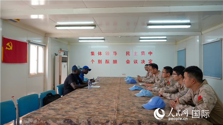 圖1 檢查組聽(tīng)取工作匯報(bào)。王軍杰攝