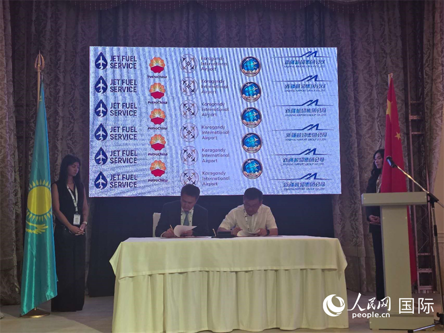 中哈簽署合作協(xié)議。人民網(wǎng)記者 李強攝