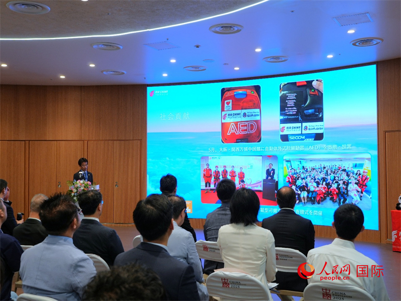 主辦方介紹國航作出的社會(huì)貢獻(xiàn)。人民網(wǎng) 許可攝