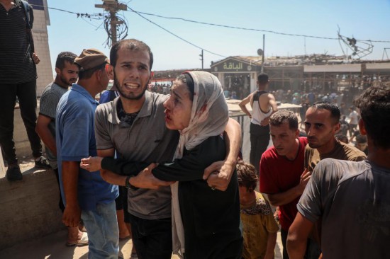   這是6月30日在加沙城沿海地區(qū)拍攝的傷者。新華社發(fā)（里澤克·阿卜杜勒賈瓦德攝）